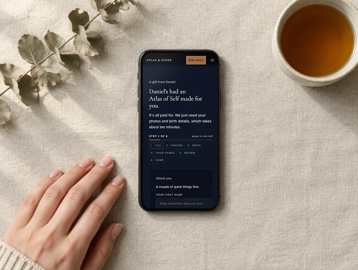 The invitation open on a phone: a gift from Daniel, all paid for